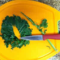 Slice the rib out of the kale. It's hard and doesn't make for good eats. Photo by Shayna Tanen